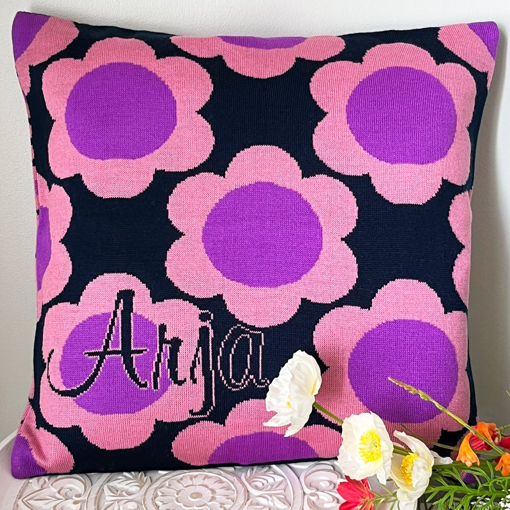 Personalized knitted pillowcase with classic floral design and custom text.